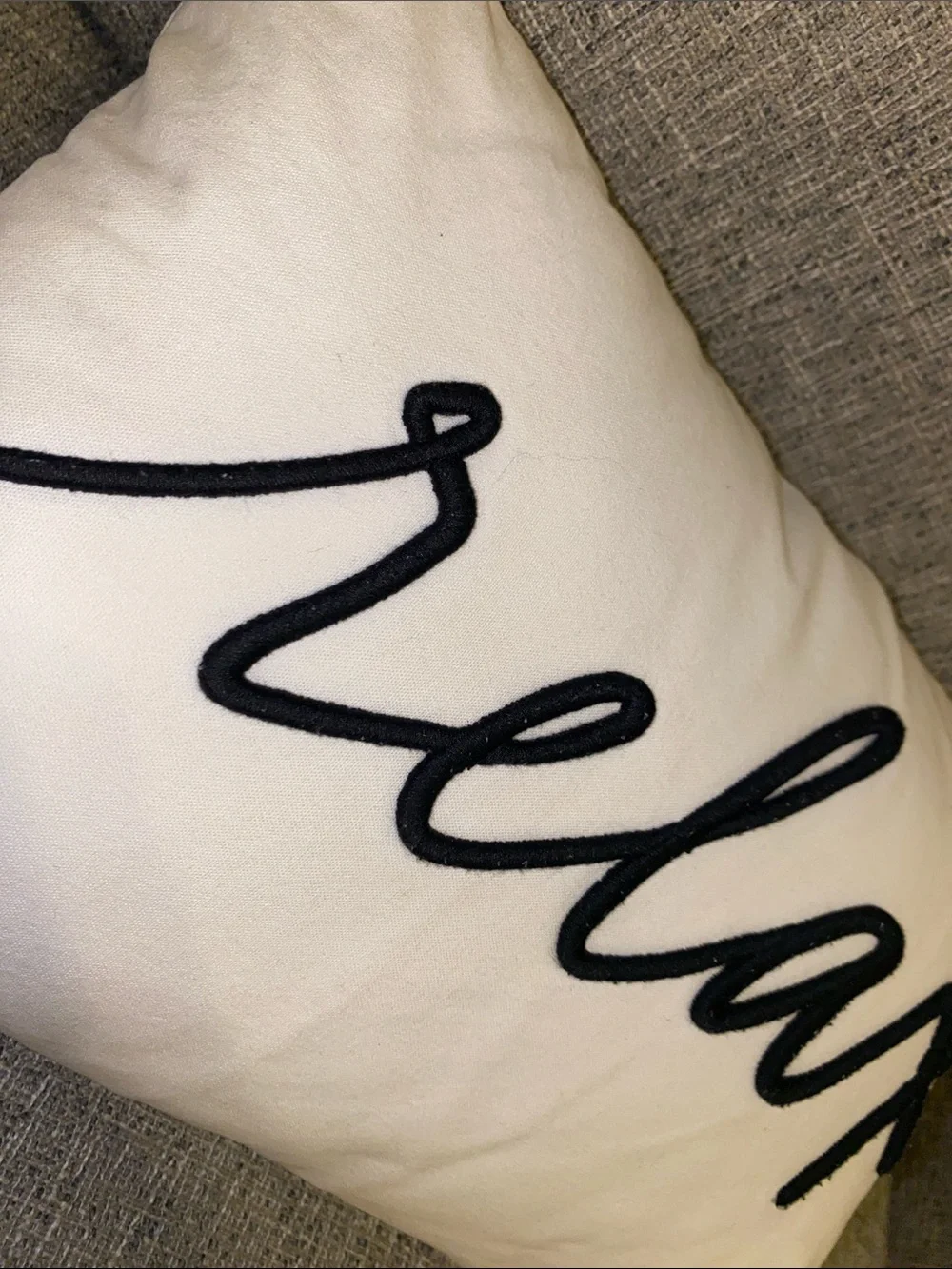 White Script 'relax' Accent Pillow with Black Embroidery